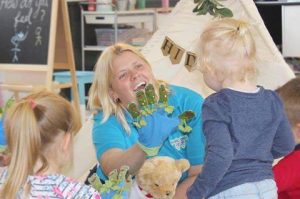 Image shows toddlers enjoying sensory time in Music Bugs class with Franchisee