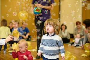 Image shows toddlers enjoying sensory time in Music Bugs class