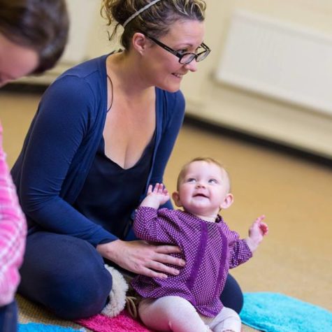 Image shows parent and baby enjoying Music Bugs class